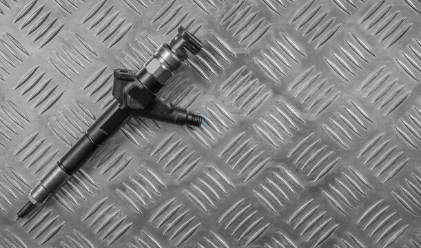 Common rail diesel nozzle. Copy space.