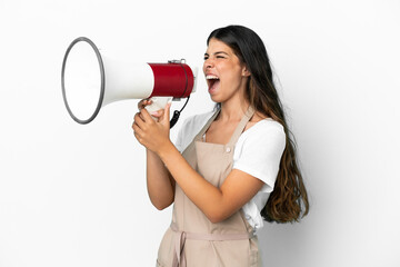 Restaurant waiter over isolated white background shouting through a megaphone