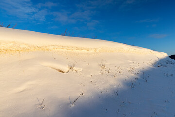 winter season with snowdrifts after snowfall