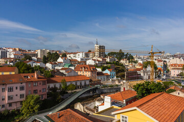 Fototapeta na wymiar Leiria, Portugal, August 29, 2021: View of Leiria downtown cityscape with Lis River canal.