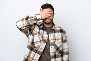 Young Brazilian man isolated on white background covering eyes by hands. Do not want to see...