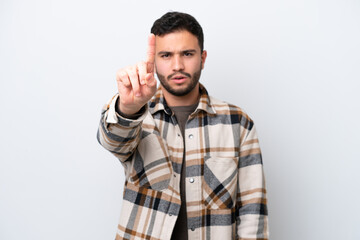 Fototapeta premium Young Brazilian man isolated on white background counting one with serious expression