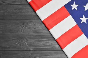 Fototapeta na wymiar USA flag on wooden background with space for text