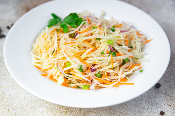 cabbage salad carrot, onion fresh vegetarian vegan meal veggie diet healthy food snack on the table copy space food background rustic 