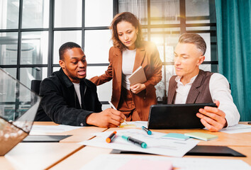 Group of business people have a meeting about company stats