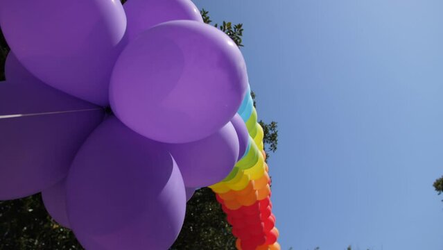 Colourful rainbow balloons in lgbt parade slow motion 4k
