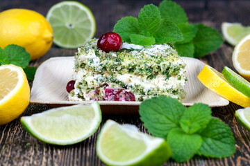 green cake with cream and lime