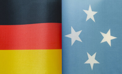 fragments of the national flags of Germany and Micronesia in close-up