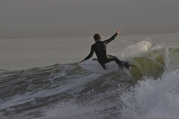 Surfing winter waves at Rincon point in California