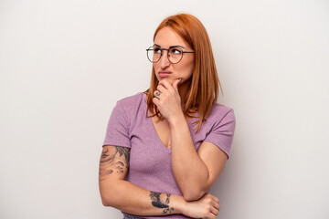 Young caucasian woman isolated on white background suffers pain in throat due a virus or infection.