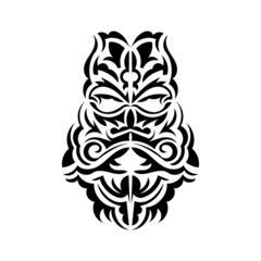 Black and white Tiki mask. Frightening masks in the local ornament of Polynesia. Isolated. Flat style. Vector illustration.