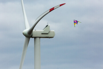 kite flying near the wind turbine