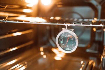 Oven temperature for cooking in a new gas oven - obrazy, fototapety, plakaty