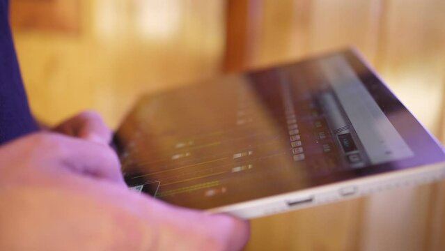 technician using digital tablet for audio and lights control party slow motion 4k