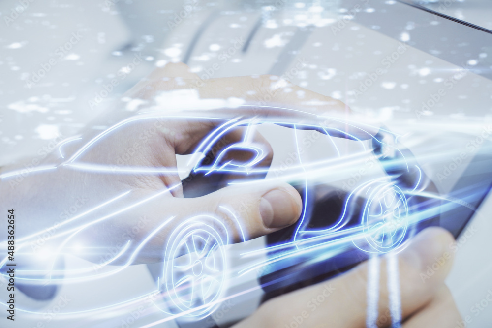 Aufkleber Double exposure of man's hands holding and using a digital device and automobile theme hologram drawing. Technology concept.