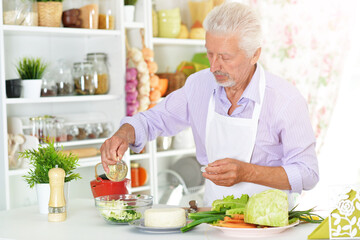 Chef cooking in kitchen, cook preparing food