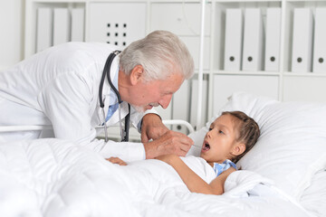 man doctor and girl in hospital