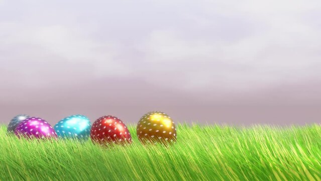 Animated colorful dots rolling eggs in green grass. Template for the Easter Day. 3d render with moving clouds in the background. 4k 