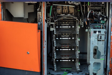 Vandalized and looted ATM. Destroyed automatic transaction machine. Consequences of demonstrations...