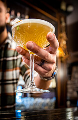 man hand bartender making cocktail on the bar counter