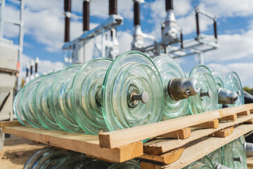Rows of glass insulators for high voltage power line
