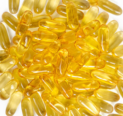 Vitamin capsules on a white background. Dietary supplements: fish oil, omega-3, omega-6, omega-9, vitamin A, E, vitamin D, vitamin D3, evening primrose oil, borage.