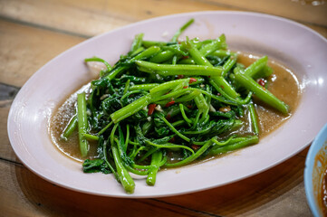 Stir fried morning glory (Phak bung fi daeng)