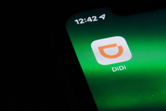 Shanghai,China-Feb. 19th 2022: close up DiDi's mobile app icon on phone screen. Didi Chuxing Technology Co formerly named Didi Dache and Didi Kuaidi is a Chinese vehicle for hire company