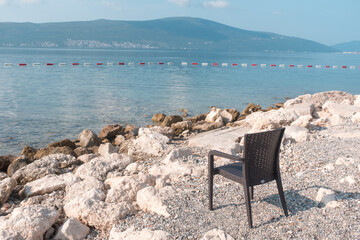 Empty chair and table with outdoor view. Tivat Porto Montenegro
