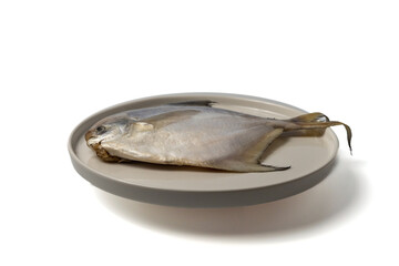 white pomfret on a white background