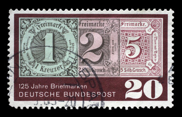 Stamp printed in Germany showing three antique stamps by Thurn and Taxis, 125th anniversary of the...