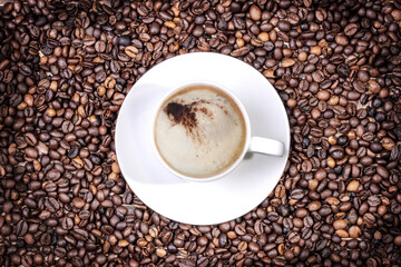 cup of coffee on old wooden table