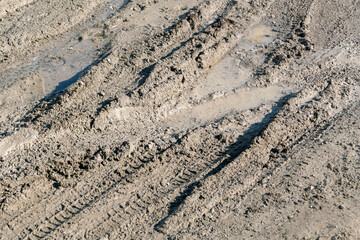 mud and dirty water puddle formed as a result of rain,