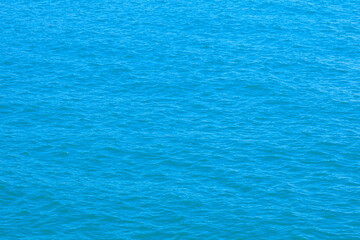 texture of the sea surface in blue