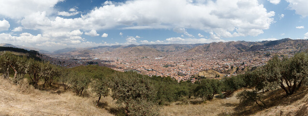 Panoramic view onto the vast city of Cusco in the Peruvian Andes with its picturesque orange houses and Plaza de Armas (Cusco, Peru, South America)