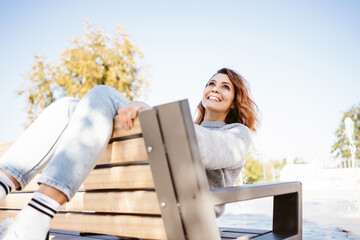 Vivacious joyful fun loving young woman with happy smile