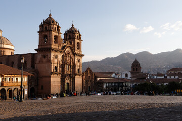 Plaza de Armas in the heart of the Peruvian city of Cusco during sunset in the Peruvian Andes (Cusco, Peru, South America)