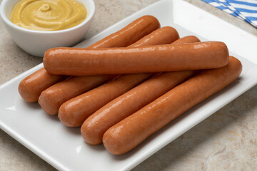Dish with Frankfurter sausage close up for a snack