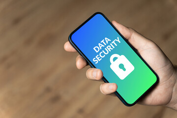 Data Security - hand holding a phone