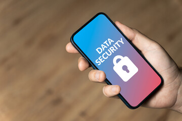 Data Security - hand holding a phone
