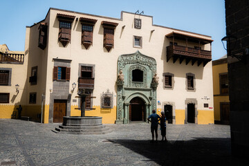 Couple staring at a old building