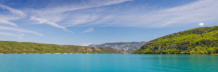 Green water of the Lake of Sainte-Croix in the Verdon Gorge in a summer day in France