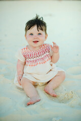 baby girl on the beach