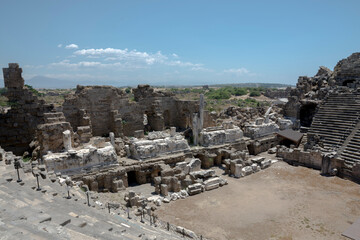 Ancient theater ruins on a sunny day with blue skies