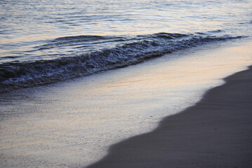 Sunset reflected on beach