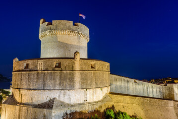 Sightseeing of Croatia. City fortress wall of Dubrovnik old town, beautiful night view