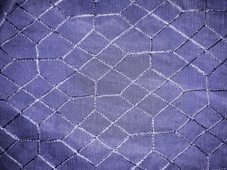 Blue fabric texture with sewing lines 