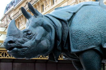 Naklejka premium Paris. France. 23 November 2020. A bronze figure of a rhinoceros in the center of Paris. Tourist center and attractions of the French capital.