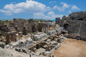 Ancient theater ruins on a sunny day with blue skies