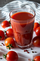 glass with tomato juice salt and pepper